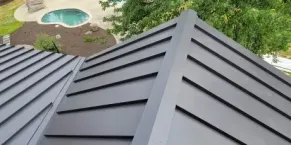Professional roof installation on a residential house