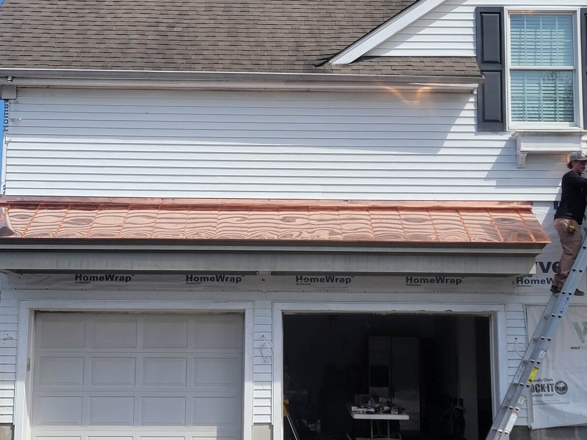 Copper roof on a house for elegance and longevity.
